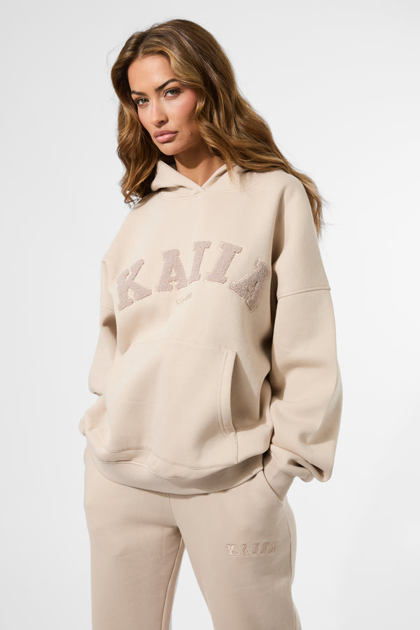 Kaiia Studio Borg Slogan Oversized Hoodie Truffle