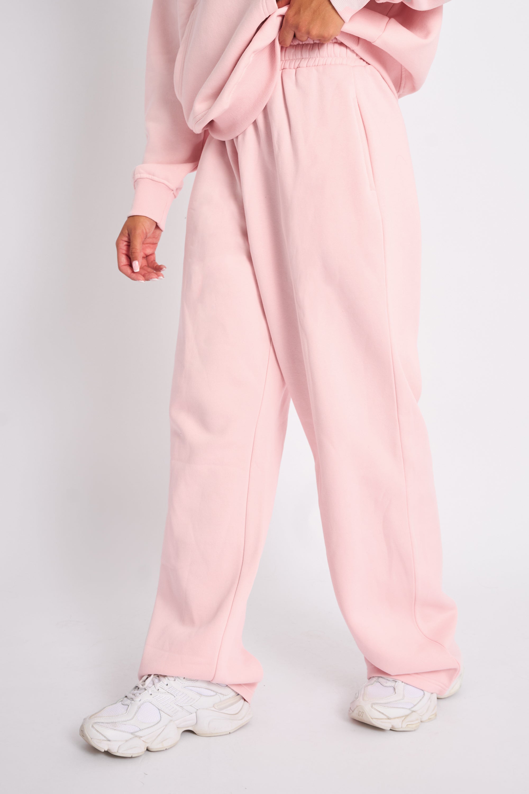 Pale pink sweatpants on sale