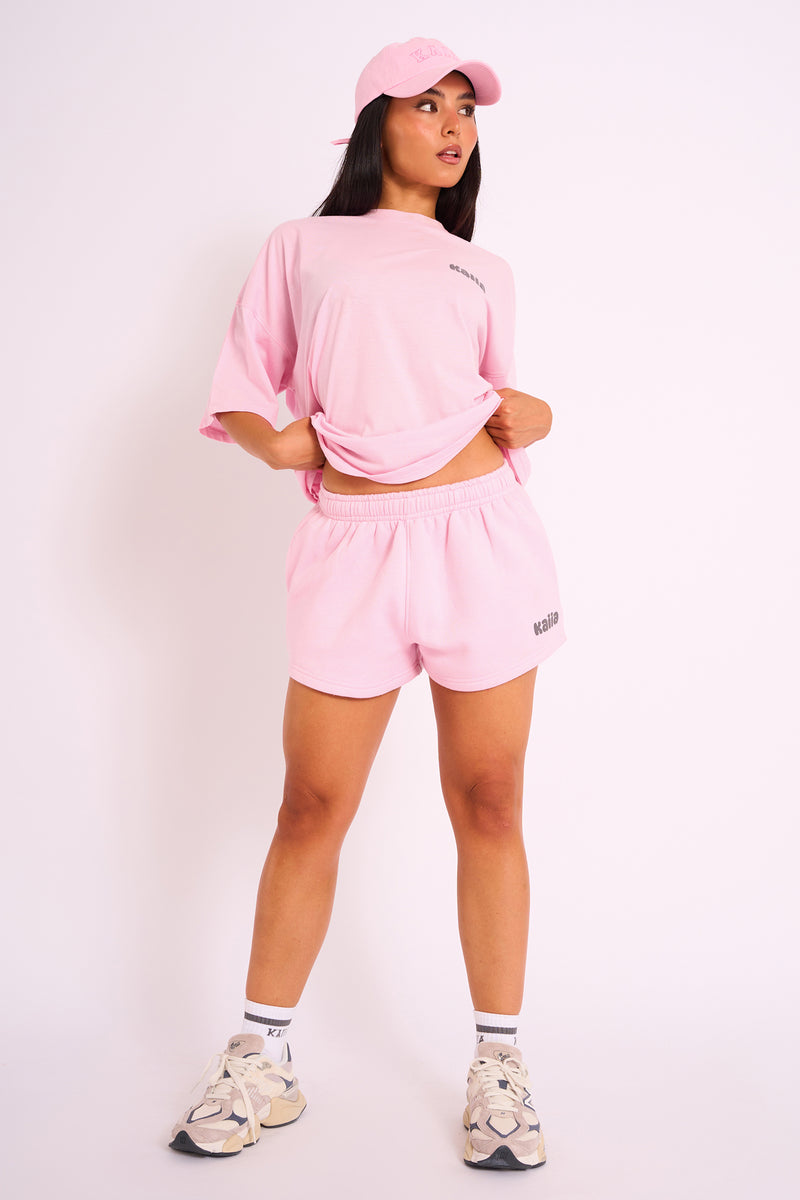 Kaiia Studio Bubble Logo Oversized Tee in Pink