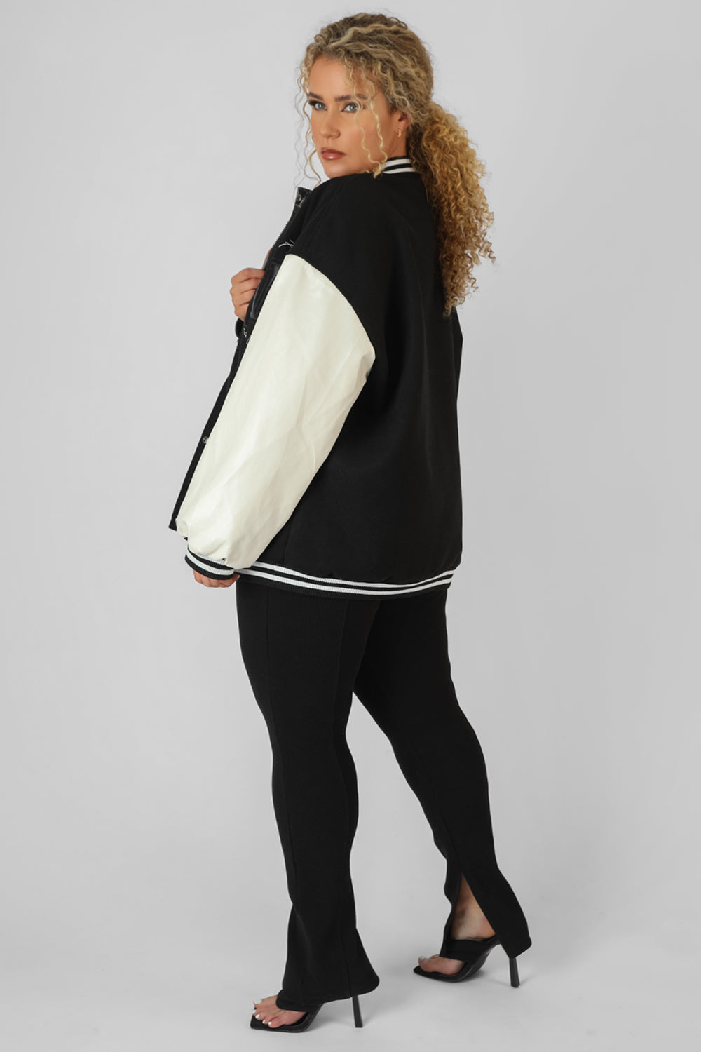 CURVE OVERSIZED VARSITY JACKET BLACK